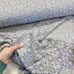 Mežģīņu audums - sudraba 150 g/m²